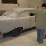 Derek in paint booth with 1957 Chevy